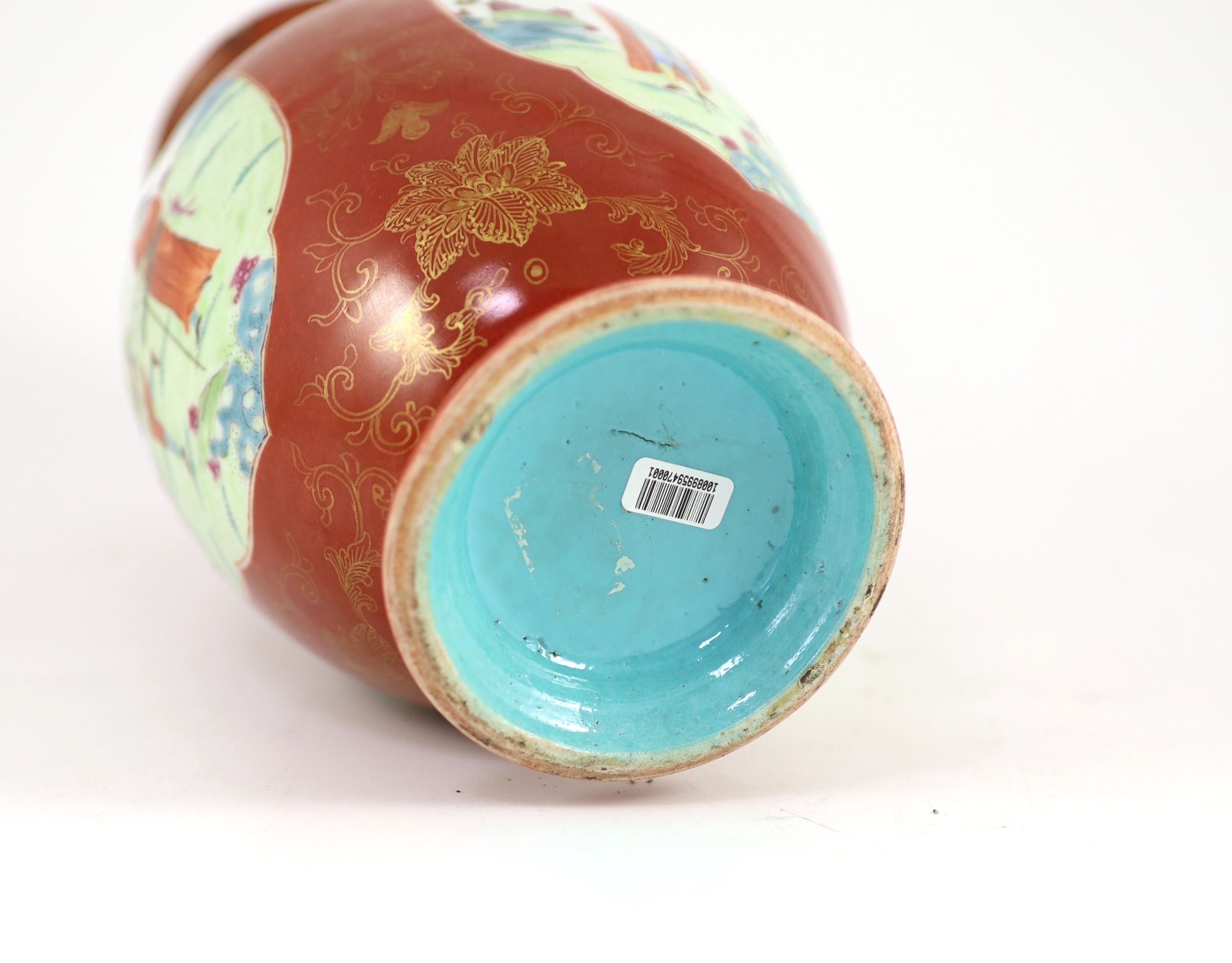 A Chinese coral ground ‘foreigners’ vase, Qianlong/Jiaqing period, 23 cm high, discoloured restoration to neck